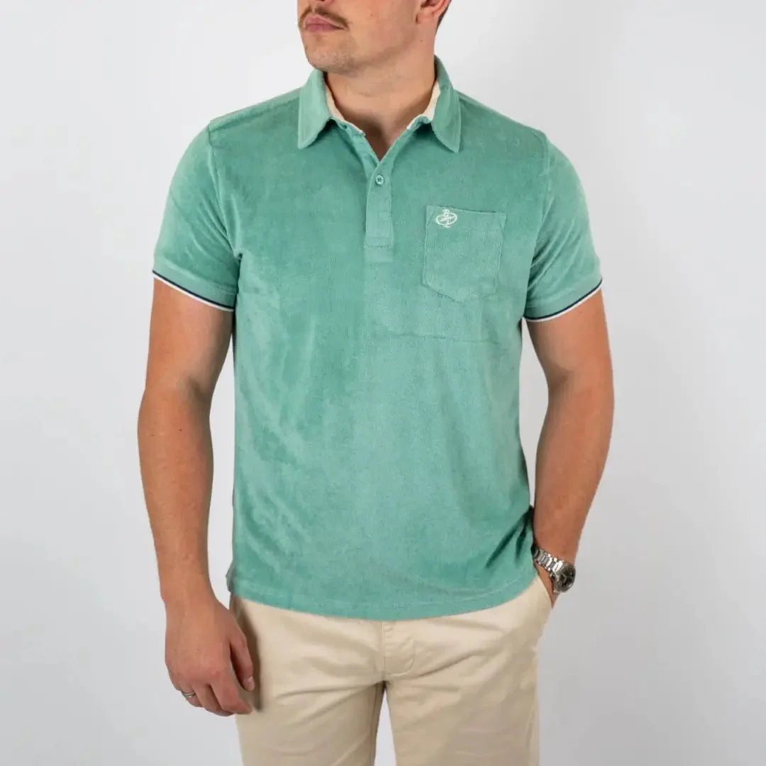 Polo vert amande en tissu éponge